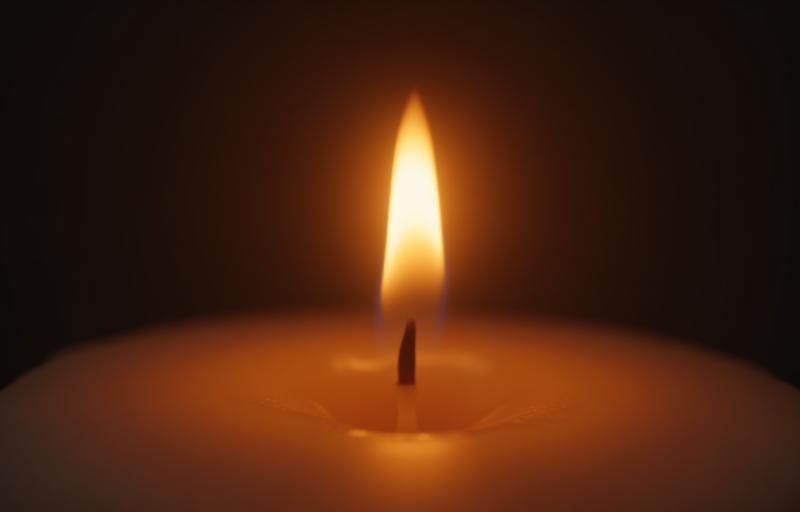 Close up of a perfectly burning candle wick